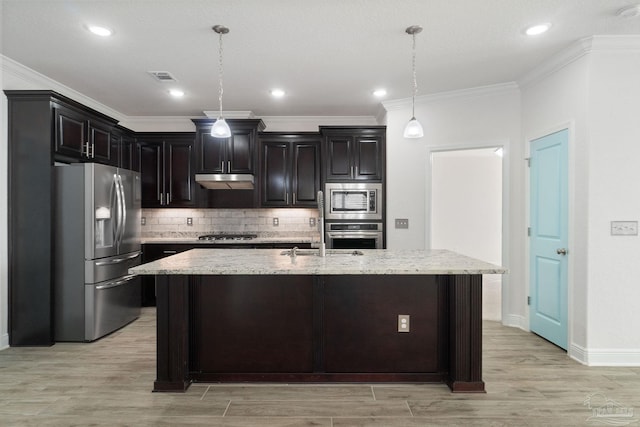 2339 Habersham Ln, Cantonment, FL 32533 - kitchen with visible vents, appliances with stainless steel finishes, hanging light fixtures, a kitchen island with sink, and under cabinet range hood