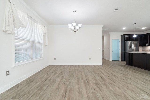2339 Habersham Ln, Cantonment, FL 32533 - interior space with light wood-type flooring, visible vents, and crown molding