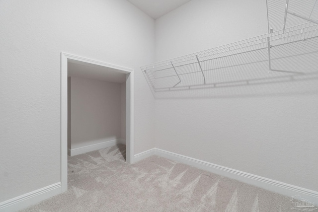 2339 Habersham Ln, Cantonment, FL 32533 - walk in closet featuring light carpet