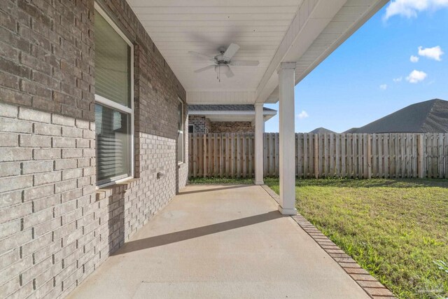 2339 Habersham Ln, Cantonment, FL 32533 - view of patio featuring ceiling fan and fence