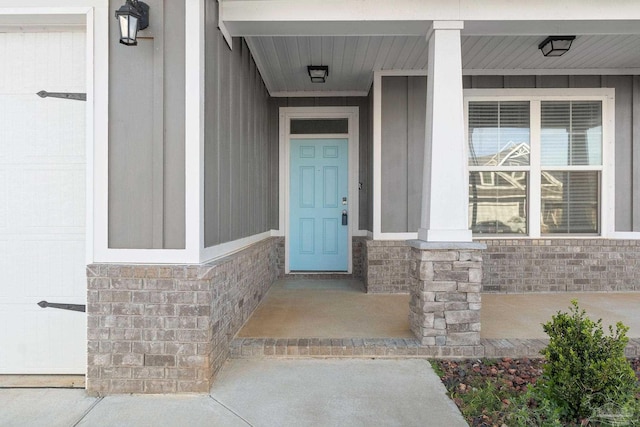 2339 Habersham Ln, Cantonment, FL 32533 - view of exterior entry with a garage and brick siding