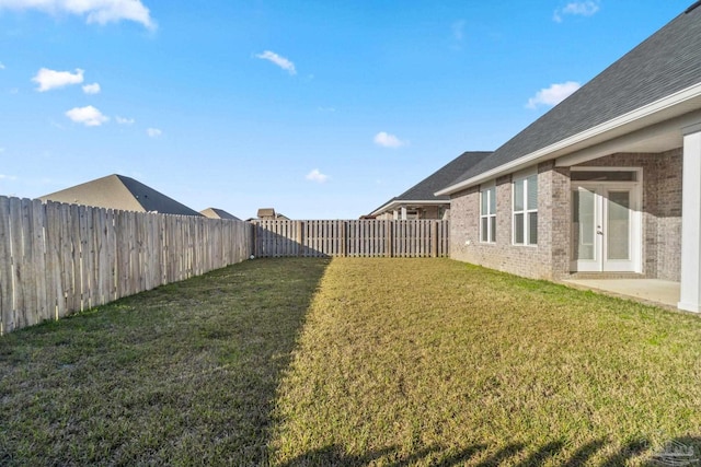 2339 Habersham Ln, Cantonment, FL 32533 - view of yard featuring french doors and a fenced backyard