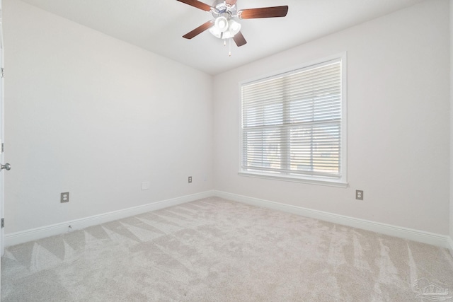2339 Habersham Ln, Cantonment, FL 32533 - spare room with light carpet, ceiling fan, and baseboards