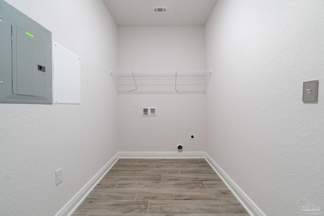 2339 Habersham Ln, Cantonment, FL 32533 - laundry area featuring laundry area, electric panel, visible vents, wood finished floors, and washer hookup