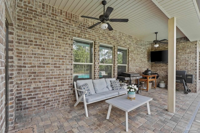 view of patio / terrace with an outdoor hangout area and ceiling fan