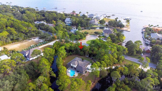 4726 Soundside Dr, Gulf Breeze, FL 32563 - aerial overview of property's location with nearby suburban area and a nearby body of water