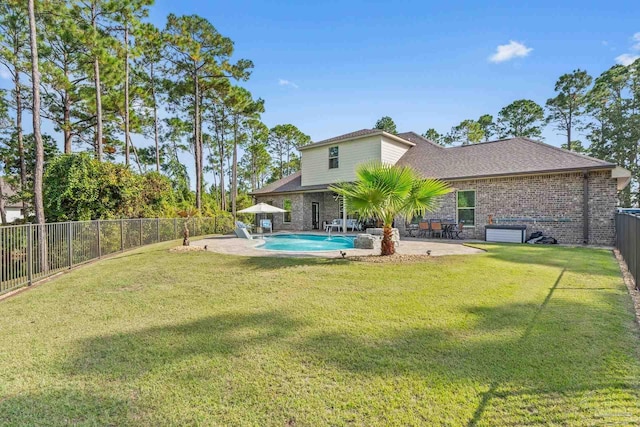 4726 Soundside Dr, Gulf Breeze, FL 32563 - rear view of property with a patio, brick siding, and a shingled roof