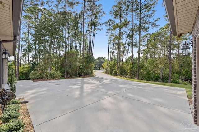 4726 Soundside Dr, Gulf Breeze, FL 32563 - view of front of property with a garage, driveway, and brick siding