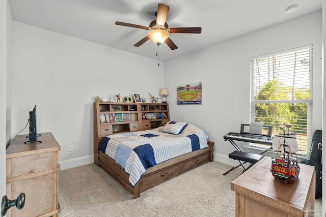 4726 Soundside Dr, Gulf Breeze, FL 32563 - carpeted bedroom featuring baseboards and a ceiling fan