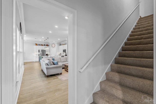 4726 Soundside Dr, Gulf Breeze, FL 32563 - stairway featuring wood finished floors, recessed lighting, and baseboards