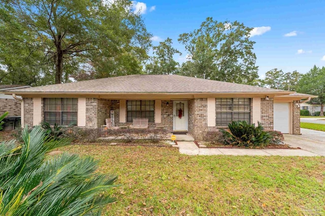 ranch-style house with a front lawn, a porch, and a garage