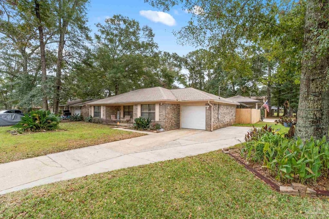 ranch-style home with a front yard and a garage