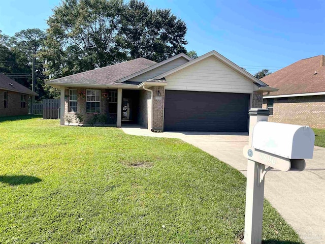 view of front facade featuring a garage and a front lawn