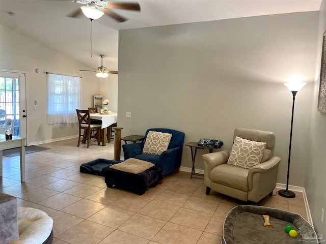 interior space with ceiling fan and lofted ceiling