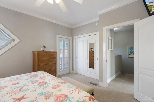 bedroom featuring crown molding, visible vents, light carpet, ceiling fan, and baseboards