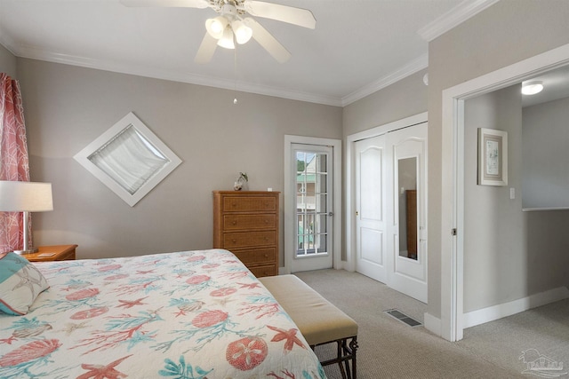 bedroom featuring crown molding, visible vents, a ceiling fan, light carpet, and baseboards