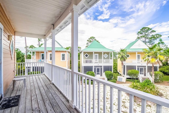 wooden deck with a residential view