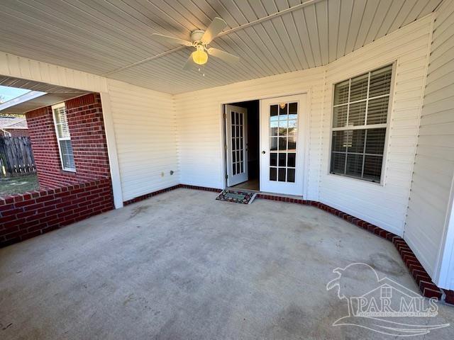 view of patio featuring ceiling fan