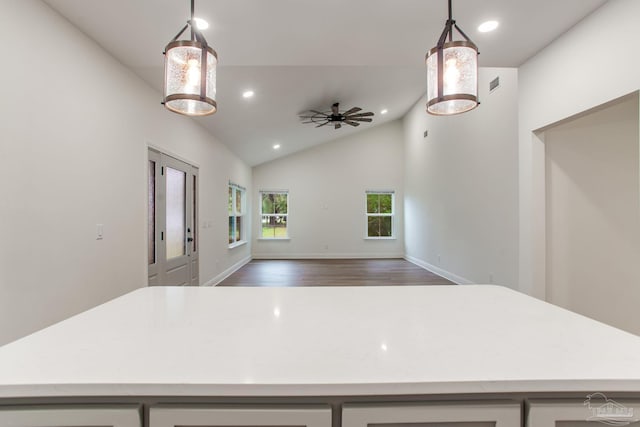 kitchen with light countertops, recessed lighting, wood finished floors, and visible vents