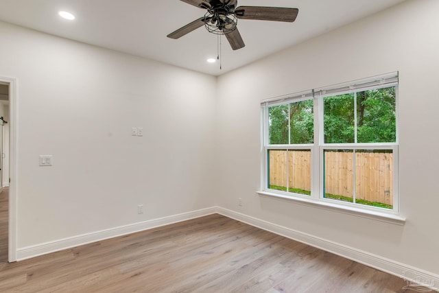 unfurnished room featuring recessed lighting, baseboards, light wood finished floors, and ceiling fan