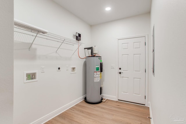 washroom with laundry area, electric dryer hookup, washer hookup, light wood-style floors, and electric water heater