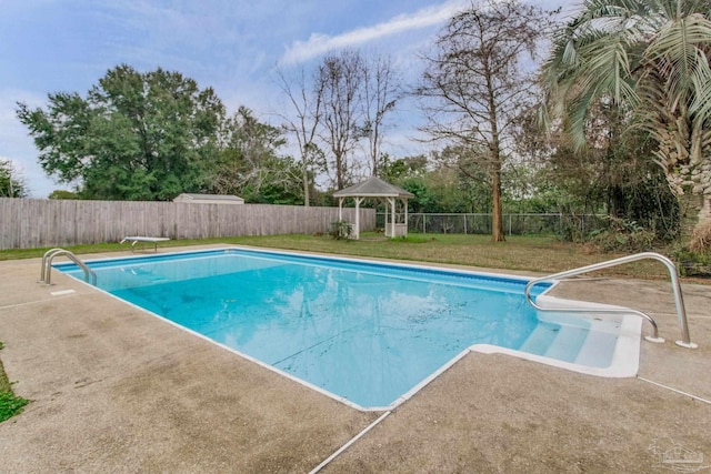 view of pool with a fenced in pool, a fenced backyard, a yard, a gazebo, and a patio area