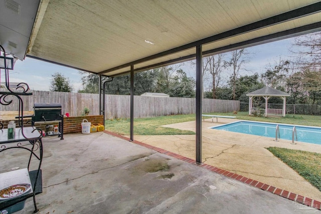 view of patio featuring a fenced in pool, a fenced backyard, and a gazebo