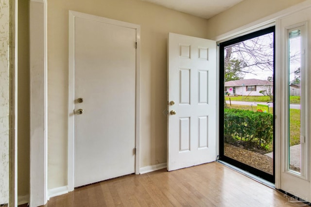 foyer entrance featuring light wood-type flooring