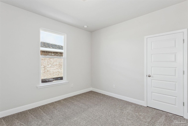 view of carpeted spare room