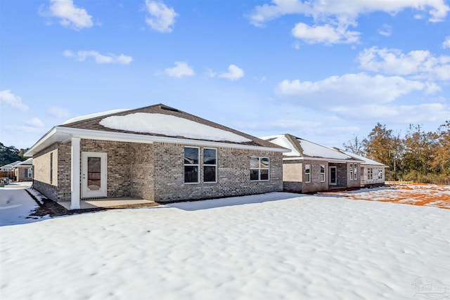 view of snow covered property