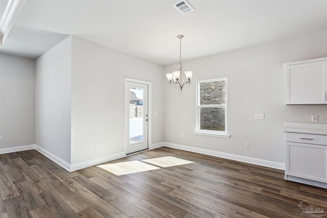 kitchen featuring sink, white cabinets, stainless steel appliances, a center island with sink, and light wood-type flooring