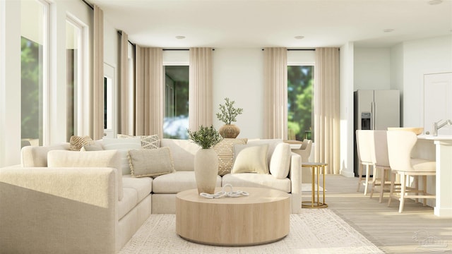 6377 Buckthorn Cir Lot 14E, Pace, FL 32571 - living area featuring plenty of natural light and wood finished floors