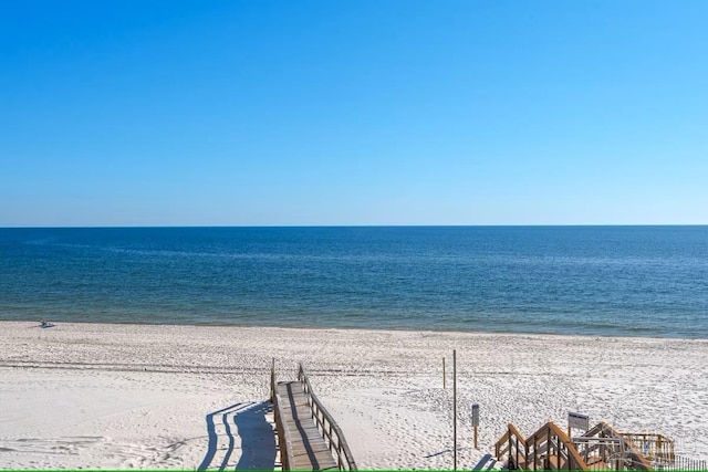 view of water feature with a beach view