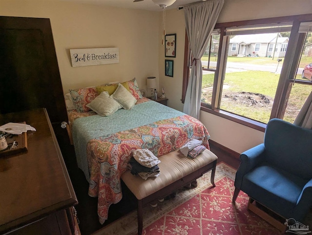 bedroom featuring multiple windows