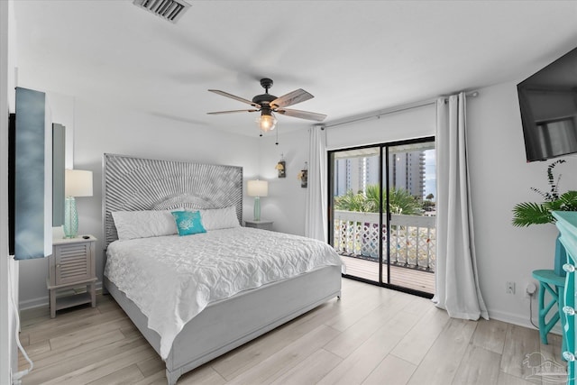 bedroom with ceiling fan, light hardwood / wood-style flooring, and access to outside