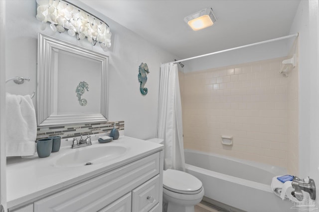 full bathroom with toilet, vanity, decorative backsplash, and shower / tub combo with curtain