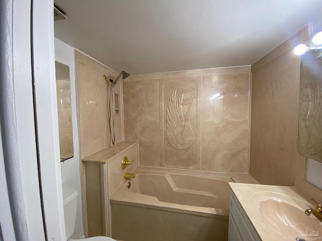 full bathroom featuring shower / washtub combination, vanity, and toilet