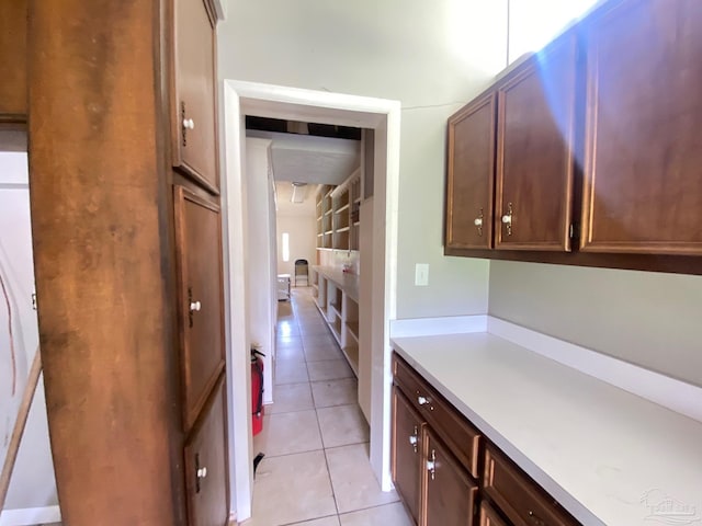 kitchen featuring light tile patterned flooring