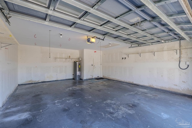 garage featuring a garage door opener and water heater