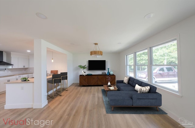 living room with light hardwood / wood-style floors