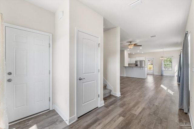 hall featuring wood-type flooring