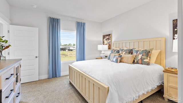 9869 Starling Dr, Pensacola, FL 32506 - bedroom with light carpet and baseboards