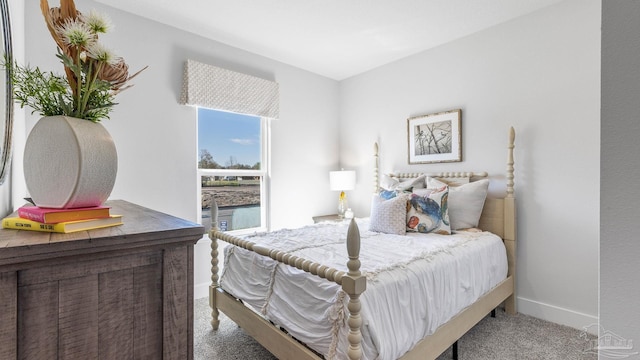 9869 Starling Dr, Pensacola, FL 32506 - carpeted bedroom with baseboards