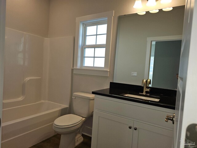 full bathroom featuring vanity, toilet, and shower / bathing tub combination