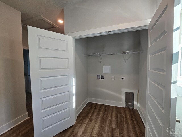 washroom with a textured ceiling, electric dryer hookup, washer hookup, and dark hardwood / wood-style flooring