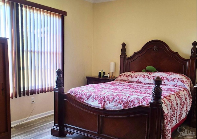 bedroom featuring hardwood / wood-style floors