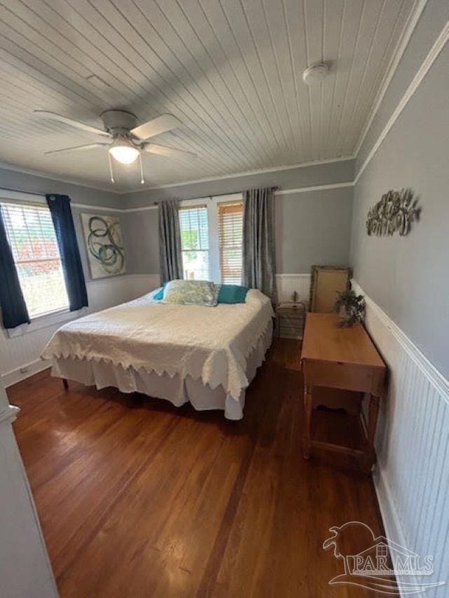 bedroom featuring multiple windows, wood ceiling, ceiling fan, and dark hardwood / wood-style floors