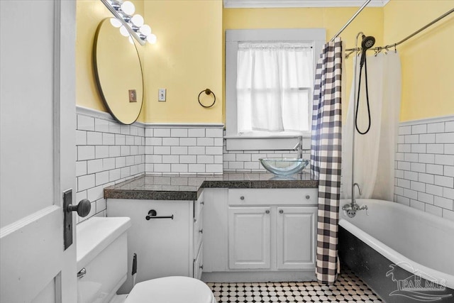 full bathroom featuring shower / bath combination with curtain, toilet, and vanity