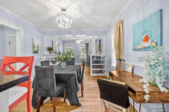 dining room with wood ceiling, crown molding, ceiling fan with notable chandelier, and light hardwood / wood-style floors