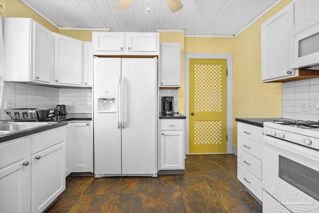 kitchen featuring ceiling fan, white appliances, and white cabinets